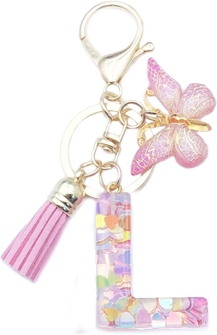 Keychain with pink butterfly, tassel, and colorful letter 'L' charm